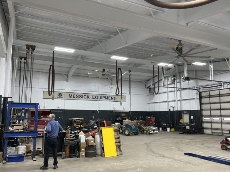 Large industrial service center with tractors, repair equipment, and 
